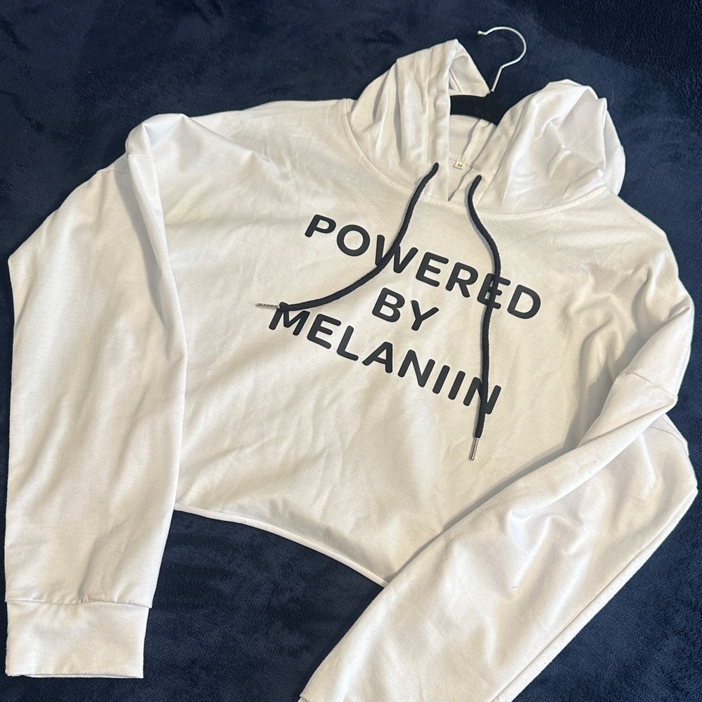 White Cropped Hoodie with 'Powered by Melaniin' Print